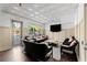 Community room featuring a seating area, TV, and a view of the pool at 1860 Hill Chase, Alpharetta, GA 30022