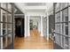 Grand foyer with hardwood floors, soaring ceilings, and elegant columns creates a striking first impression at 1860 Hill Chase, Alpharetta, GA 30022