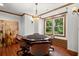Game room featuring a poker table, accent lighting, and natural light at 1860 Hill Chase, Alpharetta, GA 30022
