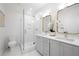 Modern bathroom features a glass enclosed shower, double vanity, and contemporary fixtures at 260 2Nd St, Fayetteville, GA 30214