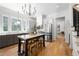 Modern kitchen with an island, stainless steel appliances, and hardwood floors at 260 2Nd St, Fayetteville, GA 30214