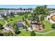 Aerial view of a park with lush landscaping, walking trails, and a scenic pond at 260 2Nd St, Fayetteville, GA 30214