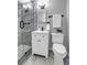 Modern bathroom with a glass-enclosed shower, white vanity, and stylish fixtures at 2921 Country Squire Ln, Decatur, GA 30033
