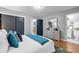 Bright main bedroom with a view of the ensuite bathroom and ample closet space at 2921 Country Squire Ln, Decatur, GA 30033