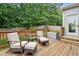 Spacious back deck with seating area, perfect for outdoor entertaining at 927 Ivey Chase Pl, Dacula, GA 30019