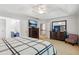 Spacious main bedroom with ceiling fan, and walk-in closet at 927 Ivey Chase Pl, Dacula, GA 30019