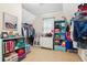 Spacious walk-in closet with ample storage, including hanging rods and shelving, ready for all your wardrobe needs at 927 Ivey Chase Pl, Dacula, GA 30019
