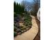 Professionally landscaped backyard with stone stairs and walkway creating a serene outdoor space at 240 Patterson Se Ave, Atlanta, GA 30316