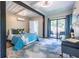 Modern bedroom featuring a comfortable bed, stylish rug, and sliding glass door with outside patio at 240 Patterson Se Ave, Atlanta, GA 30316