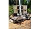Innovative modular home construction with shipping containers and heavy-duty crane at 240 Patterson Se Ave, Atlanta, GA 30316