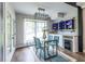 Bright dining area with glass table, modern chandelier and convenient bar area at 240 Patterson Se Ave, Atlanta, GA 30316