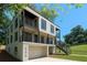 Striking modern home with multi-level balconies and clean architectural lines in a landscaped setting at 240 Patterson Se Ave, Atlanta, GA 30316