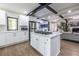 Open-concept kitchen features a large island, stainless appliances, and hardwood floors at 240 Patterson Se Ave, Atlanta, GA 30316