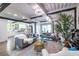 Open-concept living space with modern decor, flowing into the bright kitchen and dining areas at 240 Patterson Se Ave, Atlanta, GA 30316