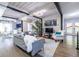 Comfortable seating area, with view of the open kitchen and dining space filled with natural light at 240 Patterson Se Ave, Atlanta, GA 30316