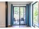 An outside patio featuring outdoor furniture accessible through the sliding glass doors at 240 Patterson Se Ave, Atlanta, GA 30316