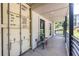 Inviting outdoor porch featuring modern shipping container style design elements and green surroundings at 240 Patterson Se Ave, Atlanta, GA 30316