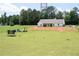 Expansive backyard with a single-story home, offering ample space for outdoor activities at 2980 Hd Atha Rd, Covington, GA 30014