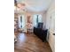 Bedroom with hardwood floors, ceiling fan, dresser, and desk workstation at 2980 Hd Atha Rd, Covington, GA 30014
