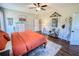 Bright bedroom features natural light, ceiling fan, and decor details at 2980 Hd Atha Rd, Covington, GA 30014