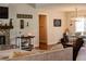 Inviting living area with a fireplace, couch, and an open floorplan leading to the dining area at 2980 Hd Atha Rd, Covington, GA 30014
