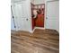 Mudroom features a bench with decorative hooks and two closets at 2980 Hd Atha Rd, Covington, GA 30014