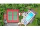 Community tennis and basketball courts next to a large pool surrounded by lounge chairs at 40 Picketts Forge W Dr, Acworth, GA 30101