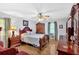 Bedroom featuring hardwood floors, natural light and an antique style furniture set at 40 Picketts Forge W Dr, Acworth, GA 30101