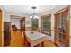 Inviting dining space with wood flooring, chandelier, and windows that let in plenty of sunlight at 40 Picketts Forge W Dr, Acworth, GA 30101
