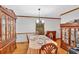 Traditional dining room featuring hardwood floors, detailed molding, and classic furnishings for elegant meals at 40 Picketts Forge W Dr, Acworth, GA 30101