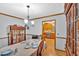 Traditional dining room featuring hardwood floors, detailed molding, and classic furnishings for elegant meals at 40 Picketts Forge W Dr, Acworth, GA 30101