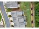 Aerial view of townhome with a well-maintained backyard with patio and fire pit at 4137 Avid Park, Marietta, GA 30062