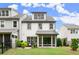 Beautiful backyard view of a home with a well-manicured lawn and a screened-in porch, perfect for outdoor living at 4137 Avid Park, Marietta, GA 30062