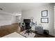 Bright living area with modern desk setup and exercise bike, perfect for versatile living and work at 4137 Avid Park, Marietta, GA 30062