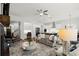 Cozy living room with modern decor, open to kitchen and dining area, perfect for entertaining at 4137 Avid Park, Marietta, GA 30062