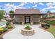 Pool house with stone columns and covered pergola leading to a concrete patio and landscaped grounds at 4137 Avid Park, Marietta, GA 30062