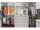 Well-organized walk-in closet with drawers, shelves, and hanging rods for optimal storage at 4137 Avid Park, Marietta, GA 30062