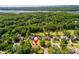 Scenic aerial view of a neighborhood community surrounded by lush greenery and a lake at 1096 Bridge Mill Ave, Canton, GA 30114