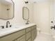 Bathroom with dual sinks and neutral color palette at 1096 Bridge Mill Ave, Canton, GA 30114