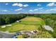 Scenic view of the community's lush green golf course and driving range on a sunny day at 1096 Bridge Mill Ave, Canton, GA 30114