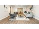 Comfortable living room featuring hardwood floors, modern furniture and stylish decor at 1096 Bridge Mill Ave, Canton, GA 30114