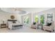 Spacious main bedroom featuring tray ceiling, a ceiling fan, and lots of natural light at 1096 Bridge Mill Ave, Canton, GA 30114