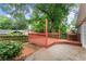 A wooden deck and partial fence offer backyard privacy at 215 Truehedge Trce, Roswell, GA 30076