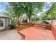 Cozy back deck with wooden railings, perfect for relaxing and outdoor enjoyment at 215 Truehedge Trce, Roswell, GA 30076