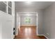 Inviting entryway with hardwood floors leading into the home's spacious interior at 215 Truehedge Trce, Roswell, GA 30076