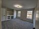 Bedroom with carpet, built-in desk, and large windows, offering comfort and natural light at 6002 Pat Mell Se Pl, Smyrna, GA 30080