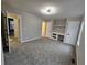 Spacious bedroom with carpet, built-in desk and modern lighting at 6002 Pat Mell Se Pl, Smyrna, GA 30080