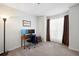 Home office featuring neutral walls, a computer desk, and a cozy blue chair at 607 Riverview Se Dr # 607, Marietta, GA 30067
