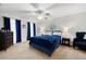 Comfortable bedroom with a queen-size bed, matching nightstands, and serene blue accents for a relaxing space at 607 Riverview Se Dr # 607, Marietta, GA 30067