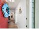 Interior shot into the entryway, showing the hardwood floors, and views into the living room at 607 Riverview Se Dr # 607, Marietta, GA 30067